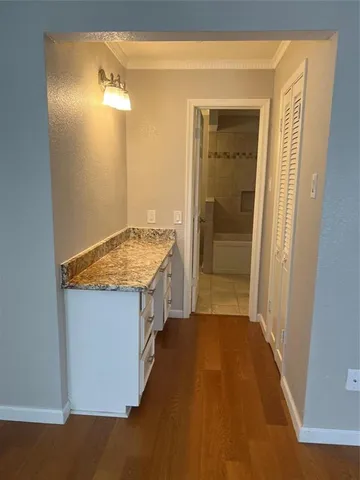 a kitchen with a stove and a sink