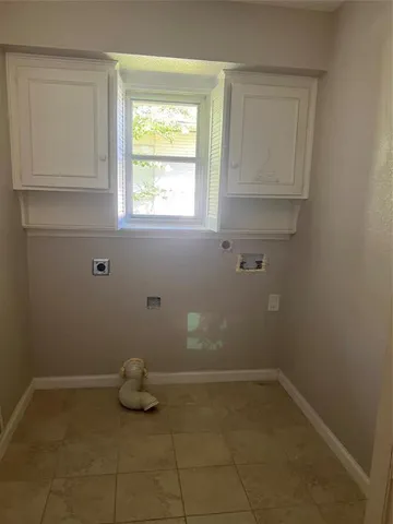 a bathroom with a granite countertop toilet and a shower