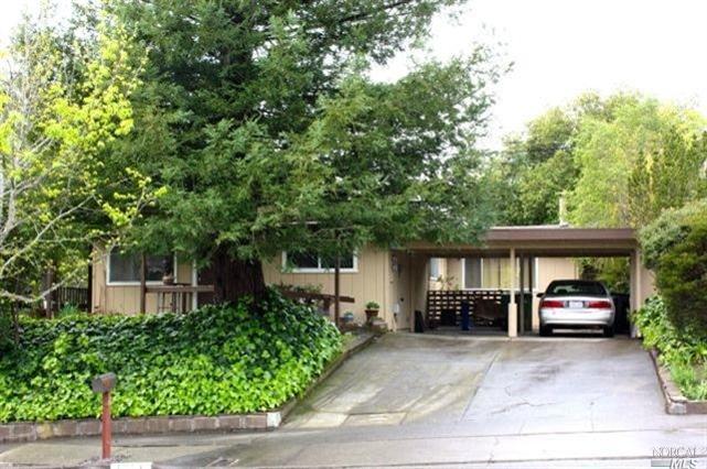 1221 St Francis Road Santa Rosa, CA 95409 - Photo 1 of 1 a car parked in front of house
