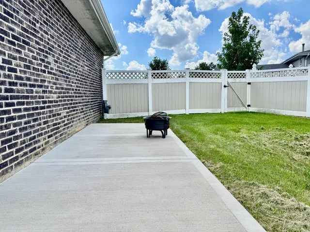 a view of a garden with a barbeque
