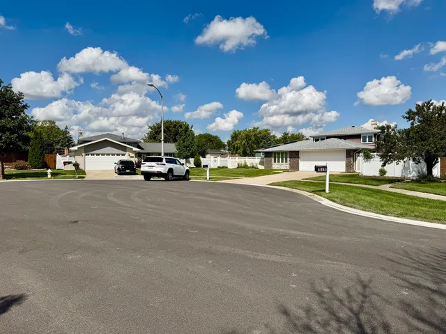 a view of a street with houses