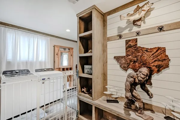 a view of a kitchen with appliances and cabinets