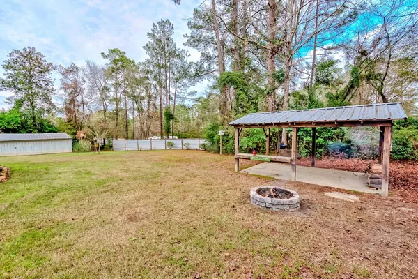 a view of backyard with green space