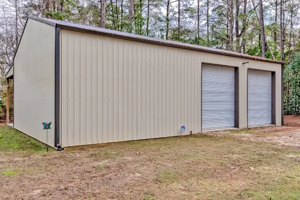a view of wooden door and outdoor space