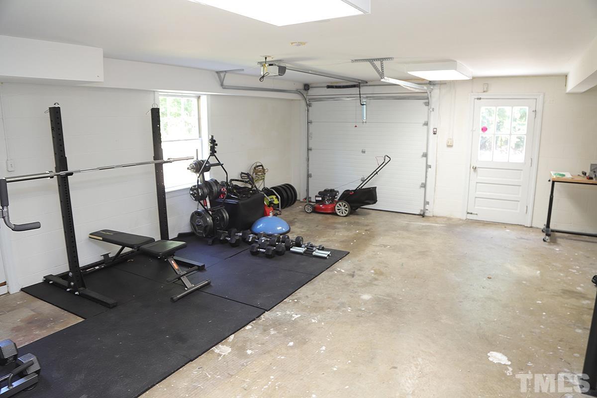 3712 Pleasant Valley Road Raleigh, NC 27613 - Photo 27 of 32 a view of a room with gym equipment