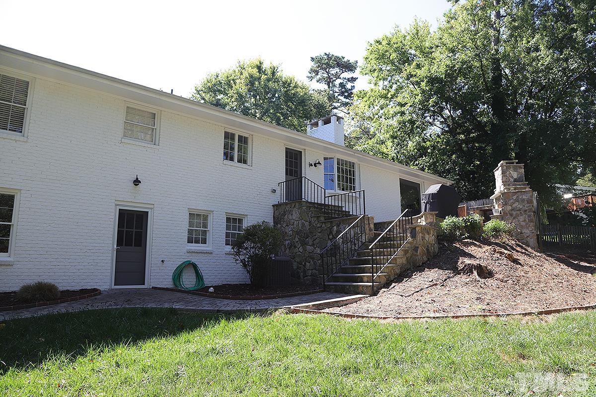3712 Pleasant Valley Road Raleigh, NC 27613 - Photo 31 of 32 a view of a house with backyard and sitting area