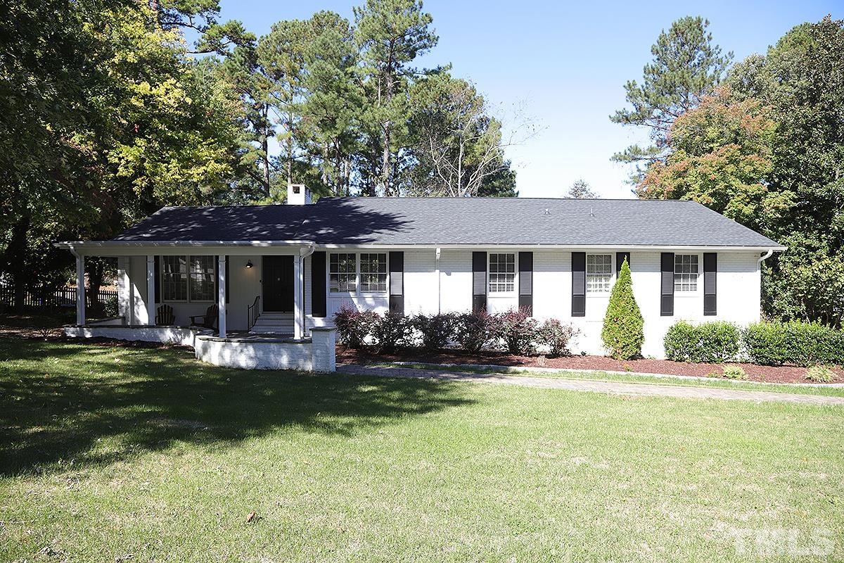 3712 Pleasant Valley Road Raleigh, NC 27613 - Photo 32 of 32 a front view of a house with swimming pool and porch with furniture