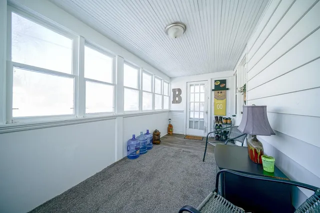 a room with furniture and a window