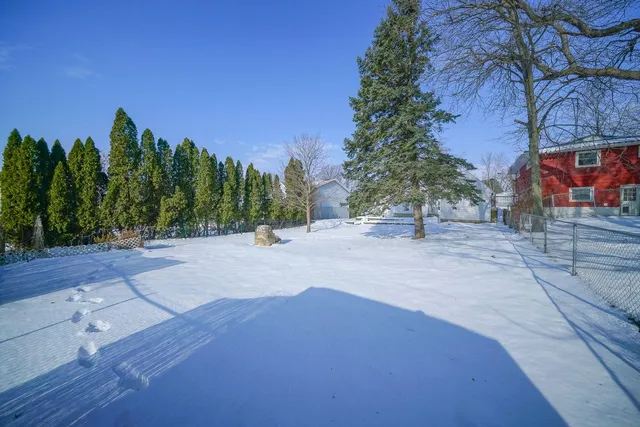 a view of a road with a building in the background