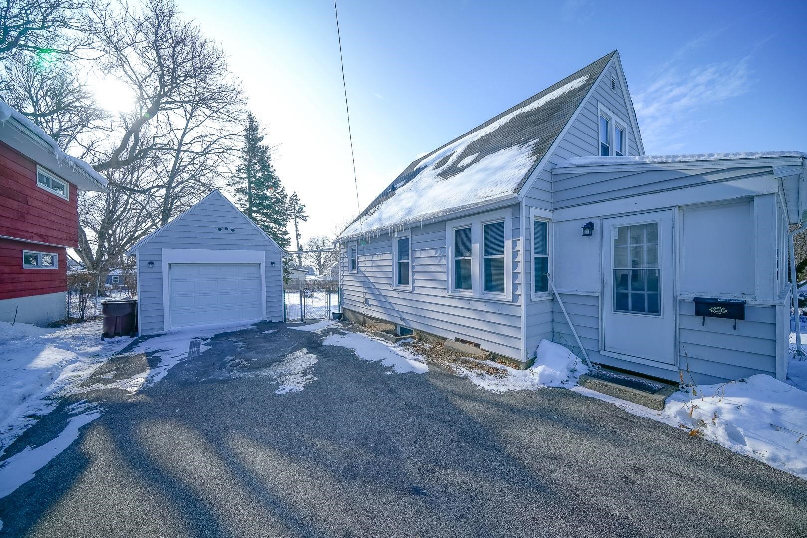 409 West Lincoln Street Mount Morris, IL 61054 - Photo 25 of 28 a view of a house with a yard
