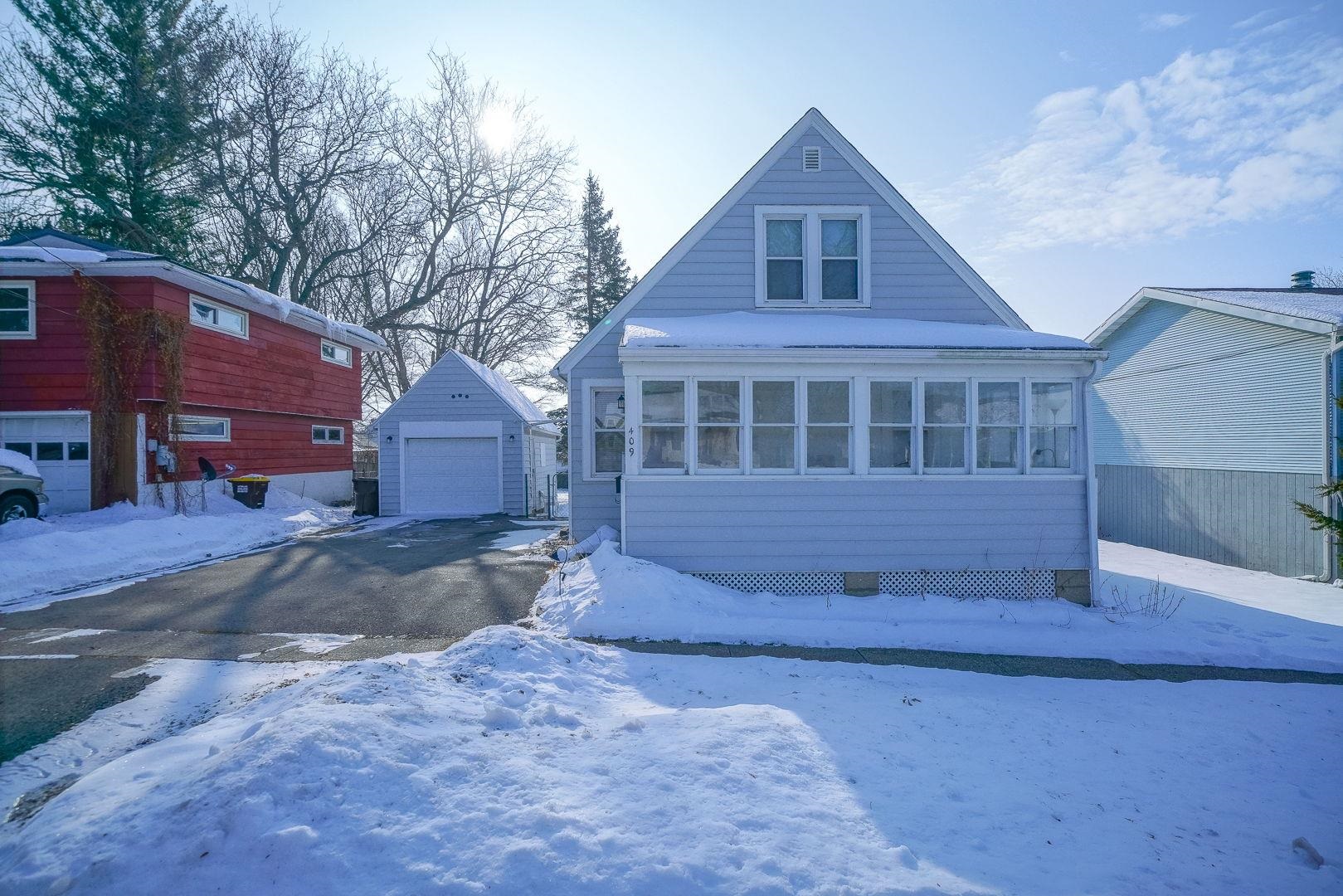 409 West Lincoln Street Mount Morris, IL 61054 - Photo 26 of 28 a view of a house with a yard