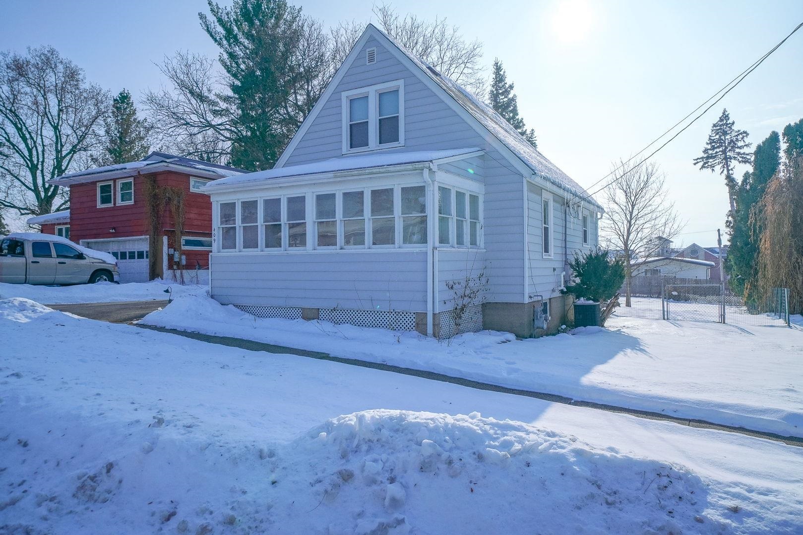 409 West Lincoln Street Mount Morris, IL 61054 - Photo 27 of 28 a view of a house with a yard