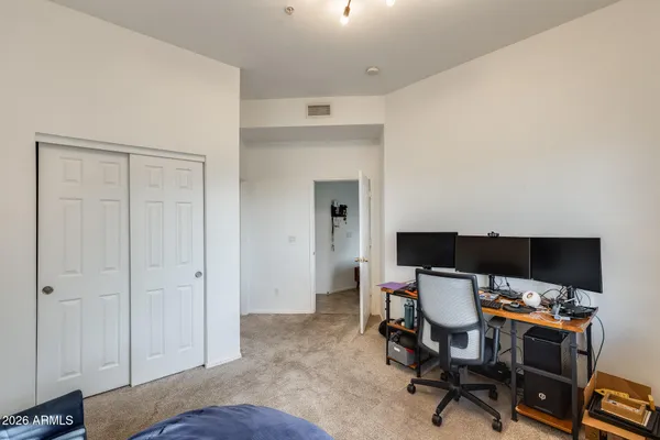 a workspace with furniture and wooden floor