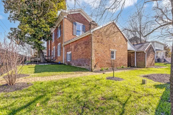 a view of a house with a big yard