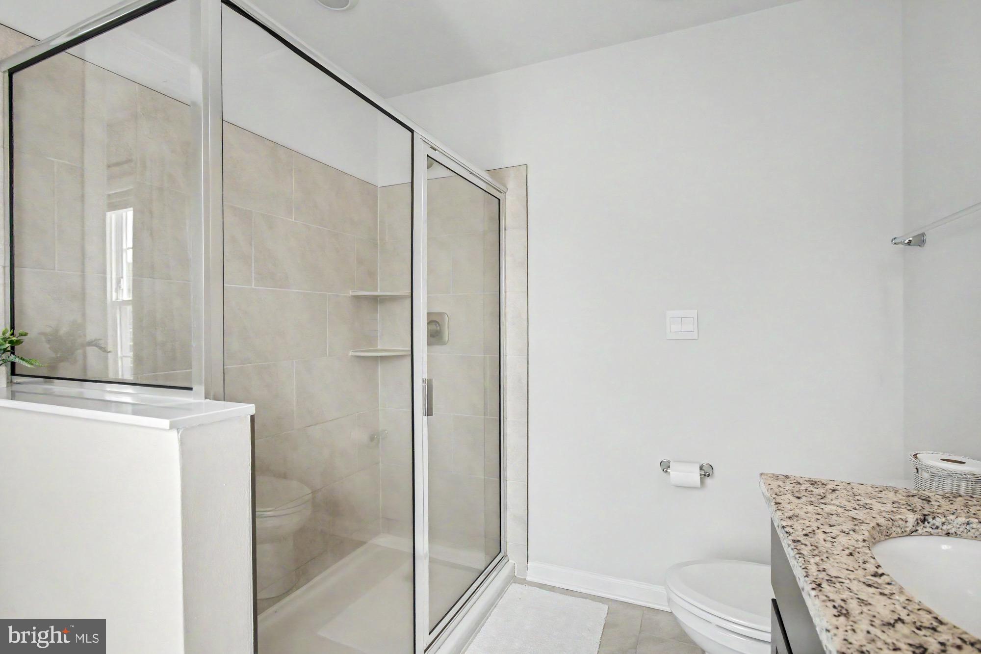 4912 Arcola Road Rosedale, MD 21237 - Photo 27 of 45 Primary bath walk-in shower