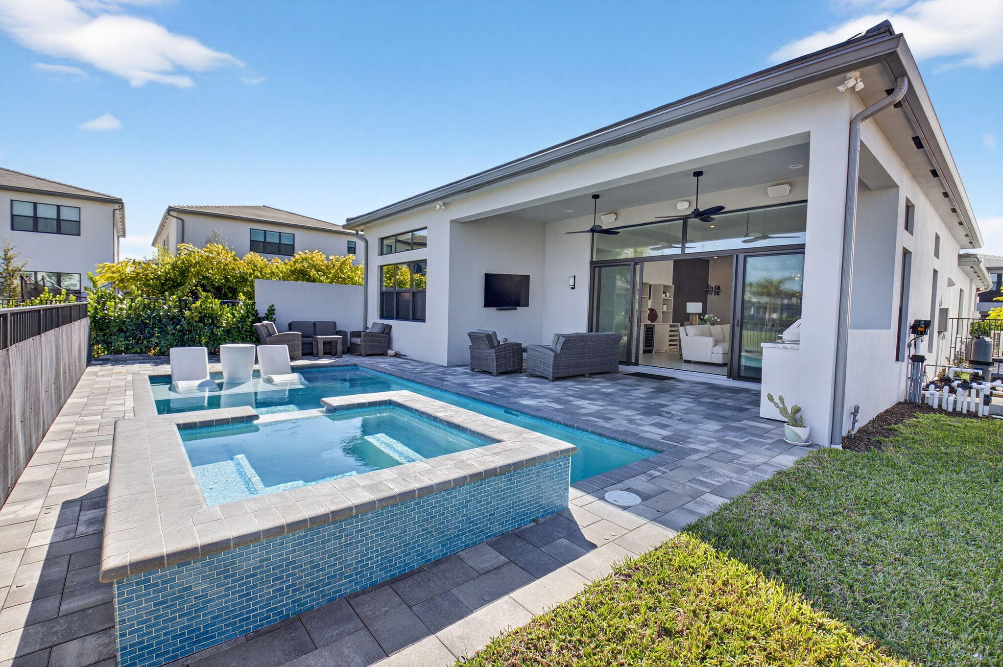 20370 Whistling Straits Way Boca Raton, FL 33434 - Photo 29 of 41 a view of living room kitchen with furniture and a rug
