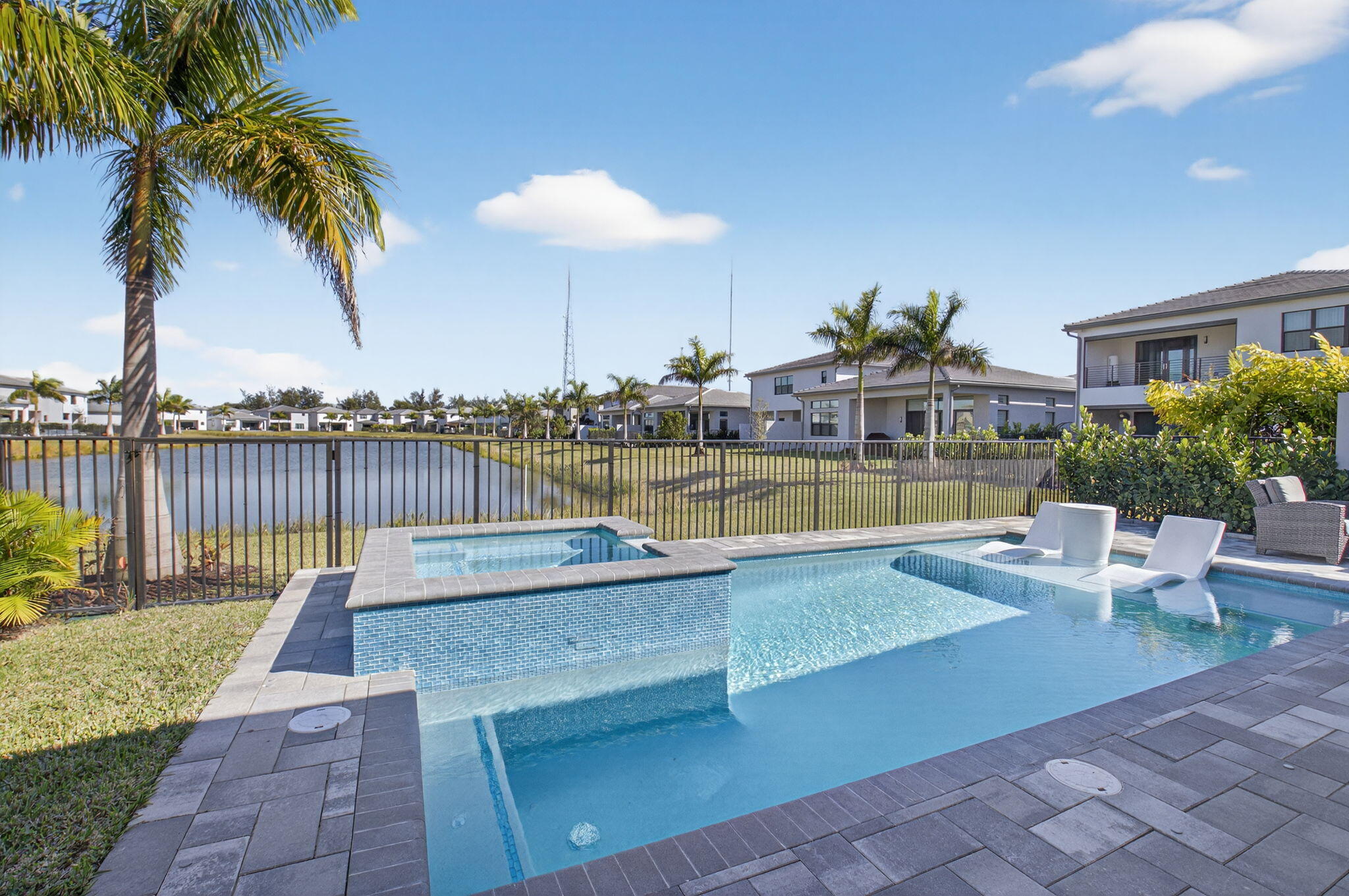 20370 Whistling Straits Way Boca Raton, FL 33434 - Photo 31 of 41 a view of a swimming pool with lounge chairs