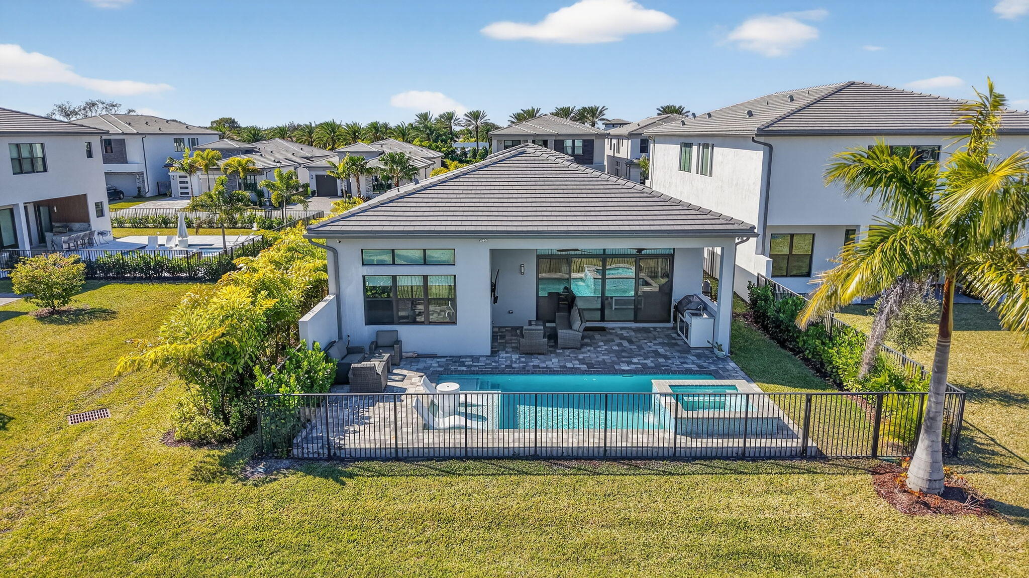 20370 Whistling Straits Way Boca Raton, FL 33434 - Photo 32 of 41 a front view of a house with a yard