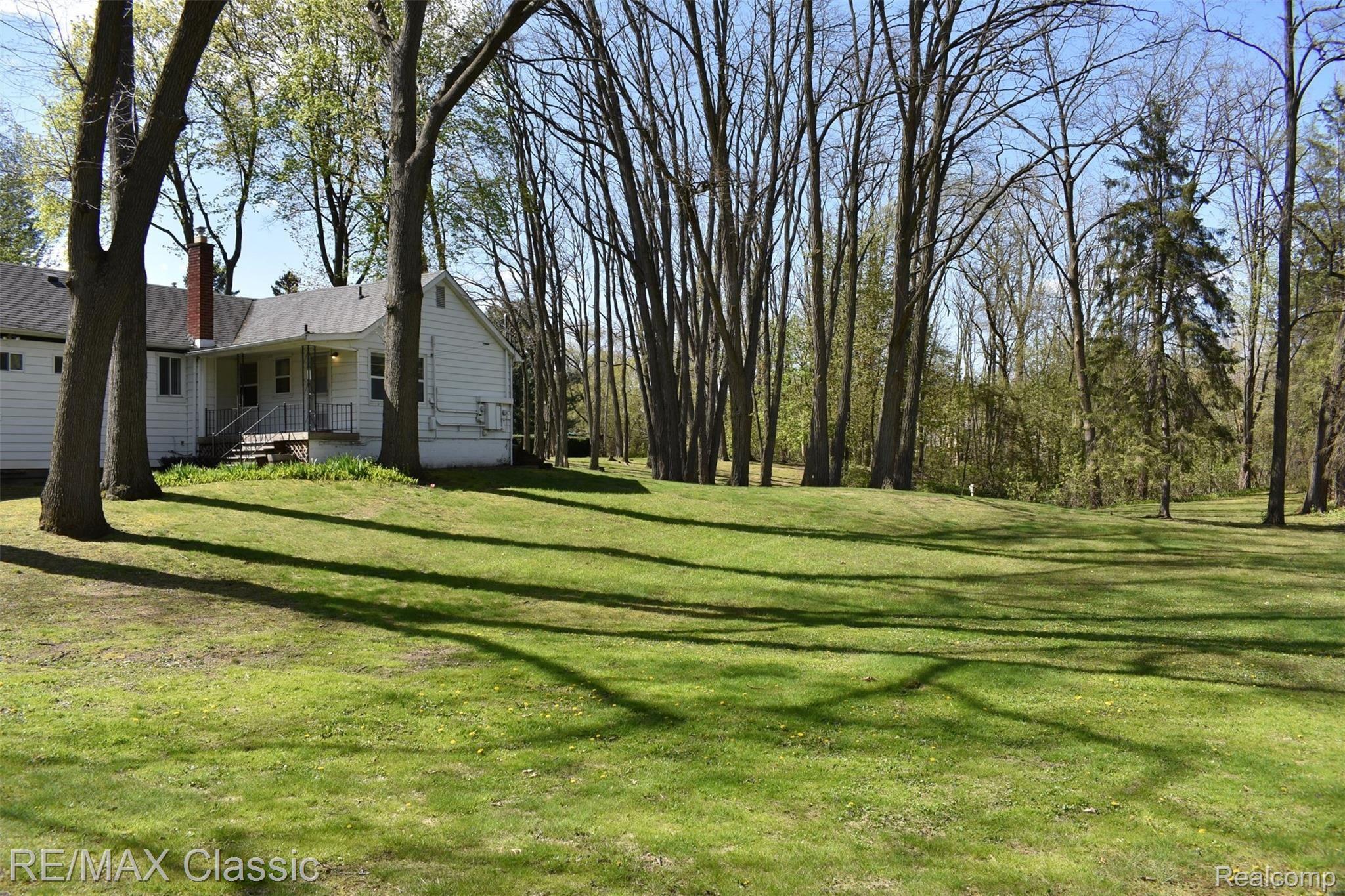 3980 Benstein Road Commerce Township, MI 48382 - Photo 47 of 68 Spring is happening, starting to get green!
