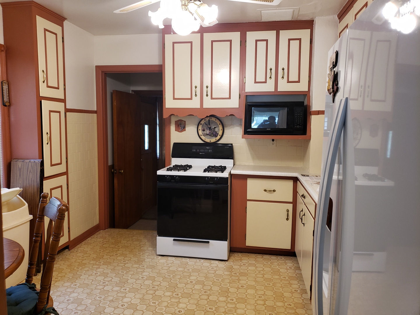 Undisclosed Address Kankakee, IL 60901 - Photo 8 of 35 a kitchen with stainless steel appliances granite countertop a refrigerator a stove and a sink with cabinets