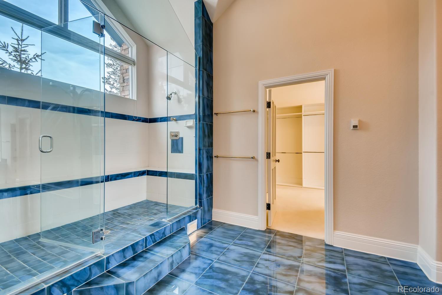 3883 Mountainside Trail Evergreen, CO 80439 - Photo 19 of 36 a view of a hallway and wooden floor