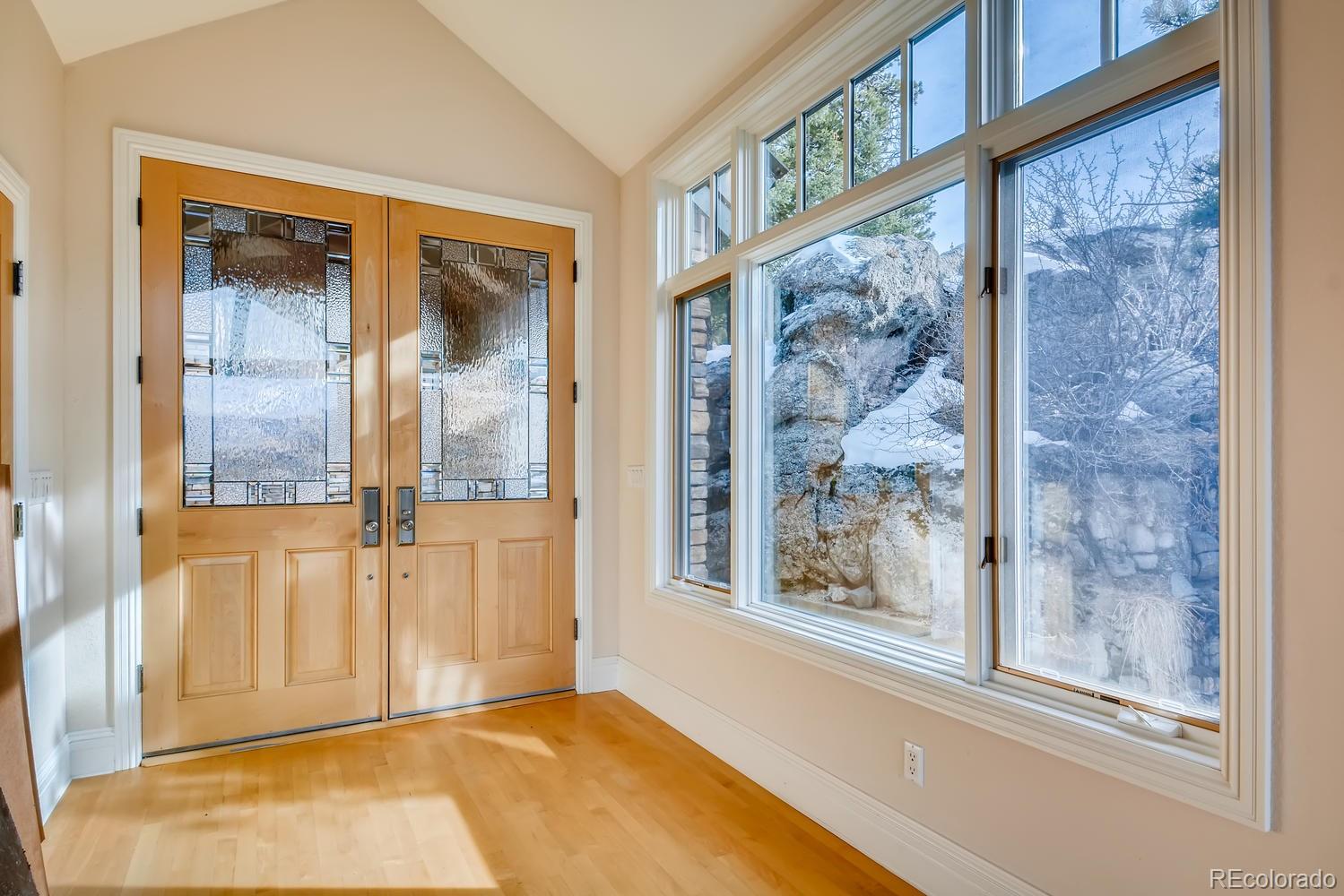 3883 Mountainside Trail Evergreen, CO 80439 - Photo 3 of 36 a view of front door