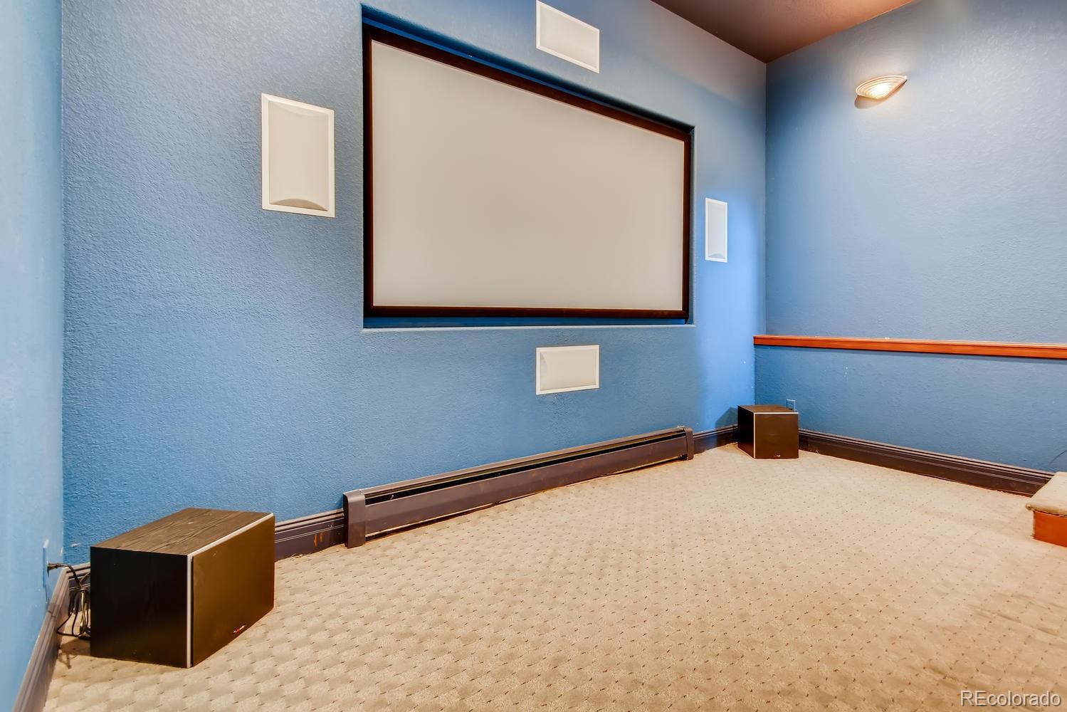 3883 Mountainside Trail Evergreen, CO 80439 - Photo 31 of 36 a view of a room with wooden floor and cabinet