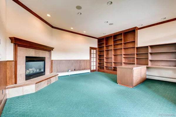 a room with furniture and a fireplace