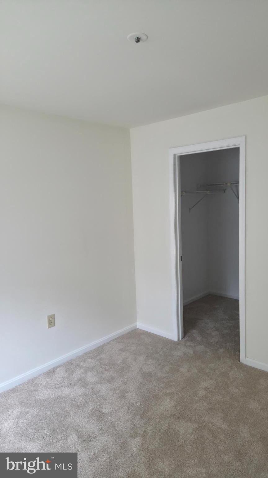 8387 Montgomery Run Road, Unit E Ellicott City, MD 21043 - Photo 11 of 25 primary bedroom