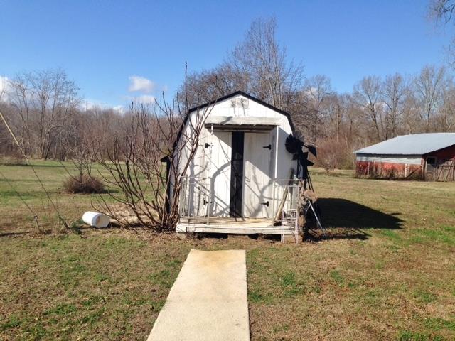 109 Ryans Path Morrison, TN 37357 - Photo 24 of 29 a front view of a house with a yard