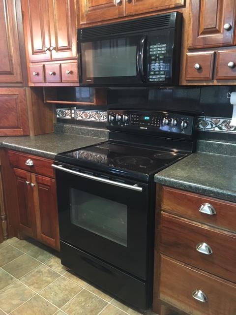 109 Ryans Path Morrison, TN 37357 - Photo 9 of 29 a kitchen with stove and cabinets