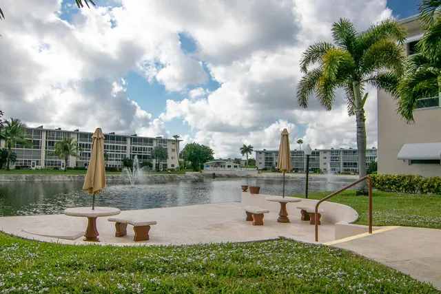 a view of a lake with a big yard