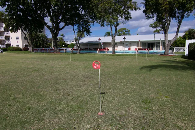 a front view of a building with garden