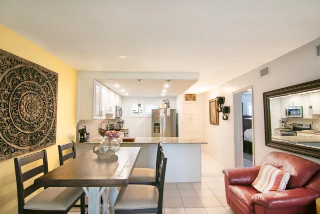 a view of a dining room with furniture