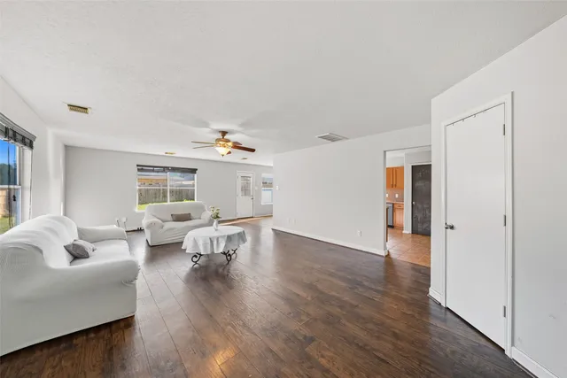 a living room with furniture and a table