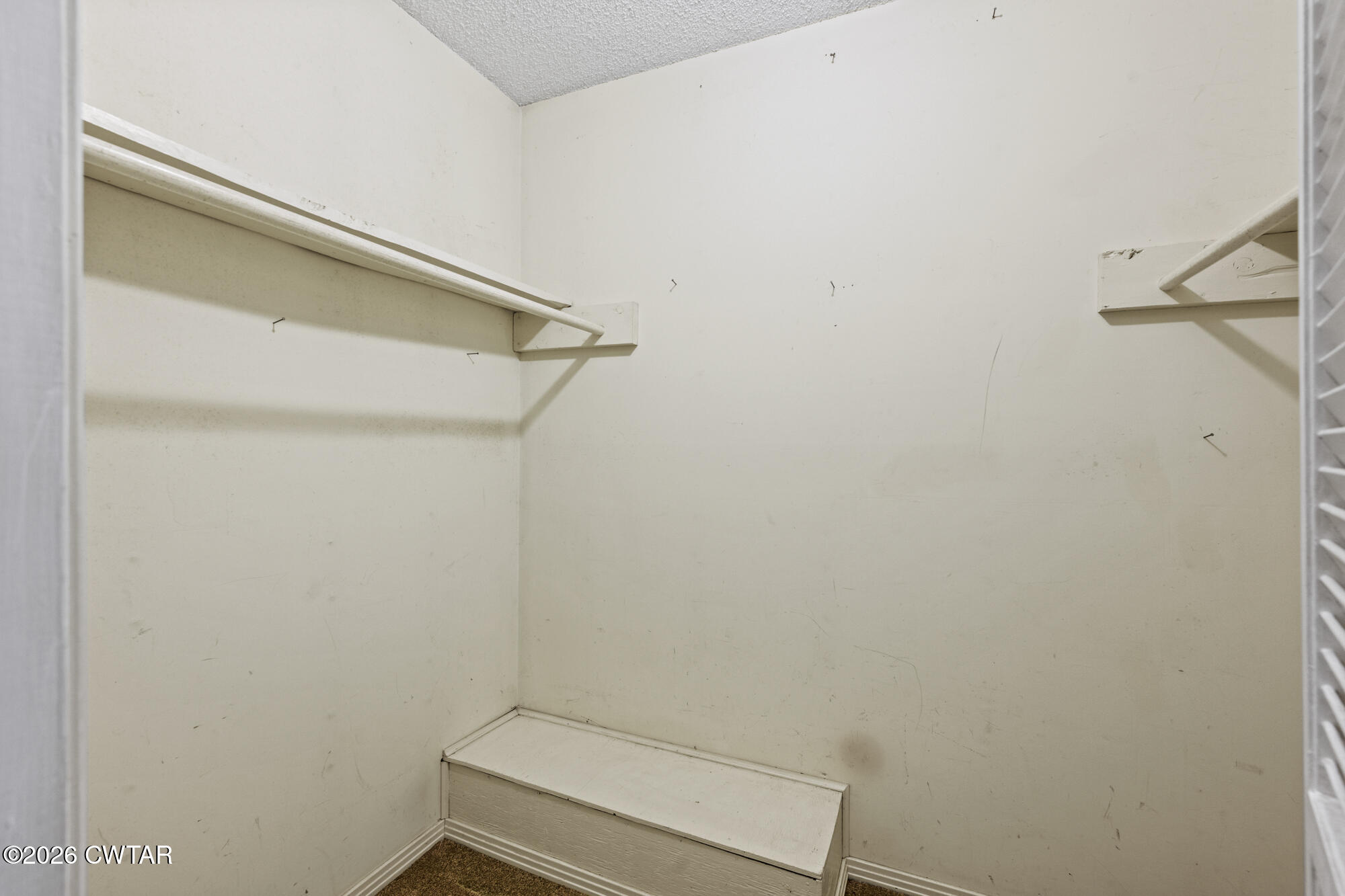 8932 Mt Carmel Road Decaturville, TN 38329 - Photo 27 of 47 a view of small space with empty racks on the wall
