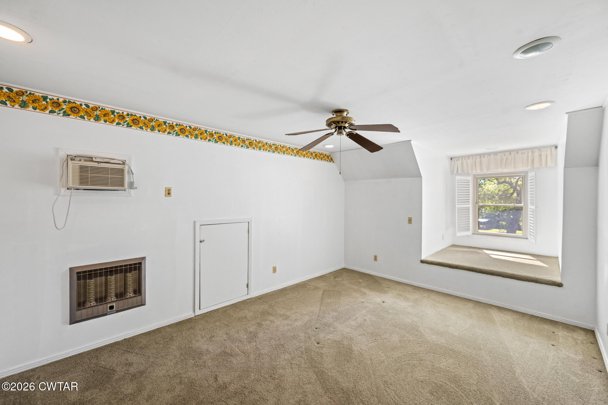 8932 Mt Carmel Road Decaturville, TN 38329 - Photo 28 of 47 a view of a livingroom with a ceiling fan and window