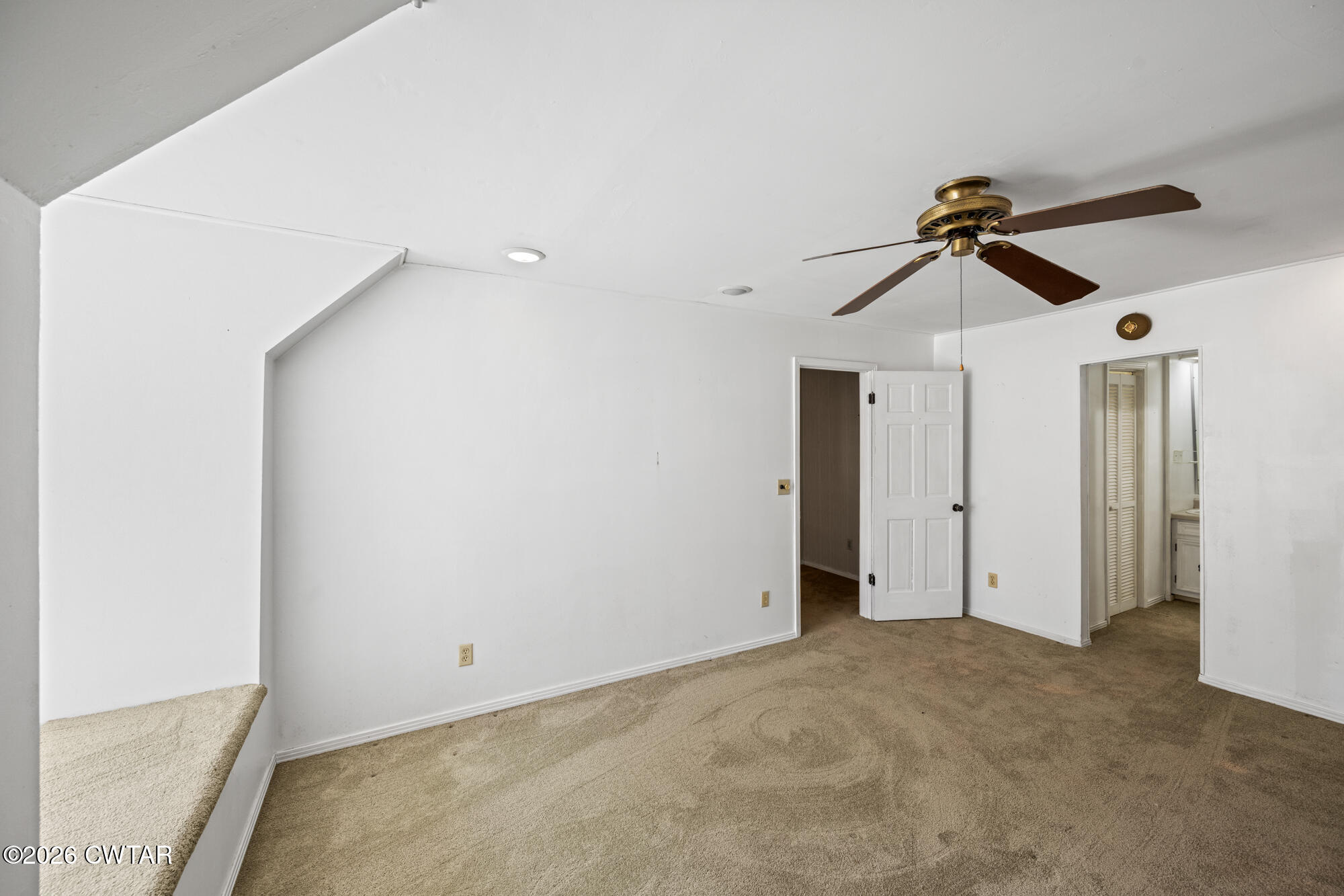 8932 Mt Carmel Road Decaturville, TN 38329 - Photo 29 of 47 a view of room with a ceiling fan