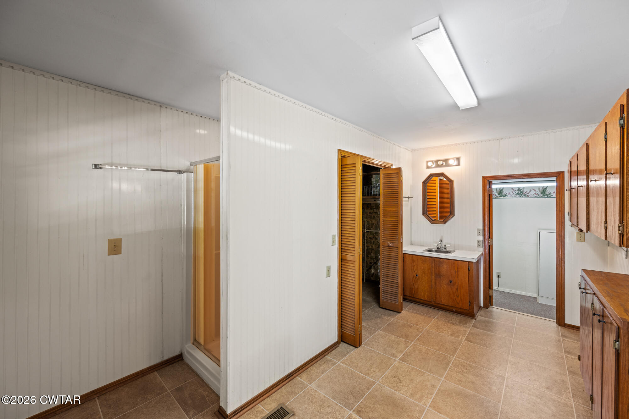 8932 Mt Carmel Road Decaturville, TN 38329 - Photo 31 of 47 a view of a storage & utility room