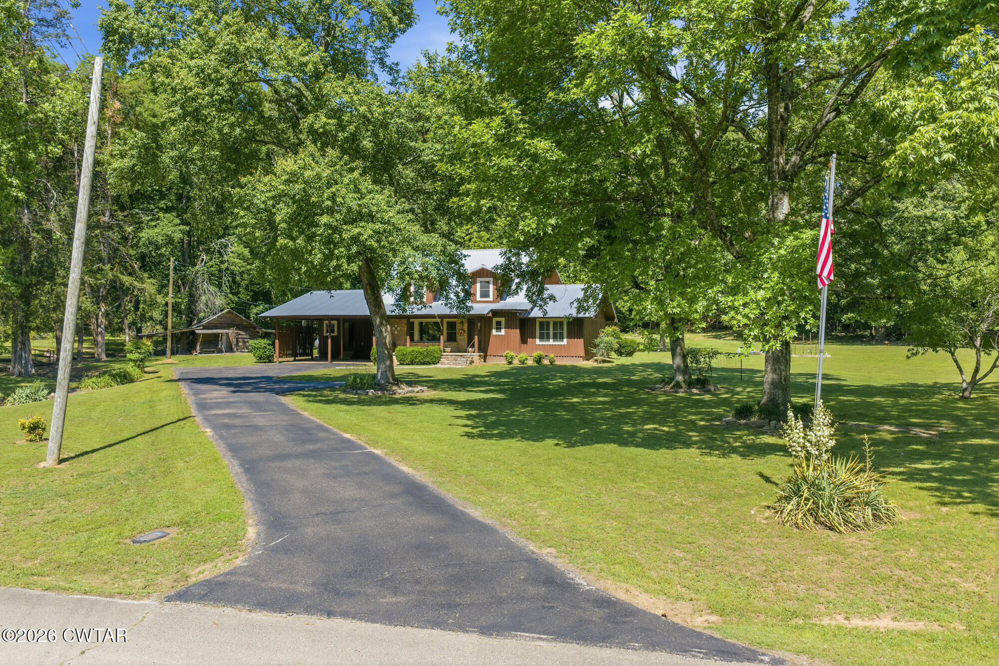 8932 Mt Carmel Road Decaturville, TN 38329 - Photo 38 of 47 a view of a park with large trees