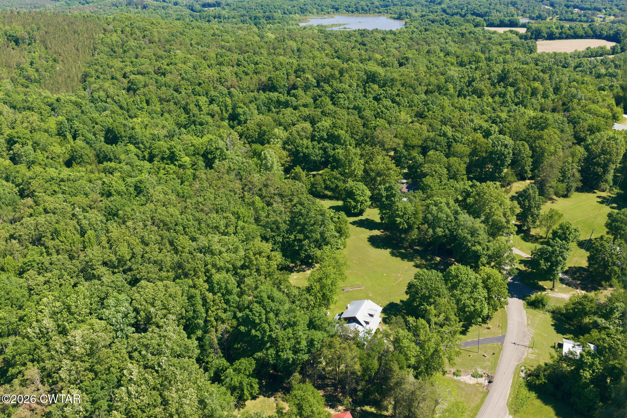 8932 Mt Carmel Road Decaturville, TN 38329 - Photo 43 of 47 a view of a lake with a park
