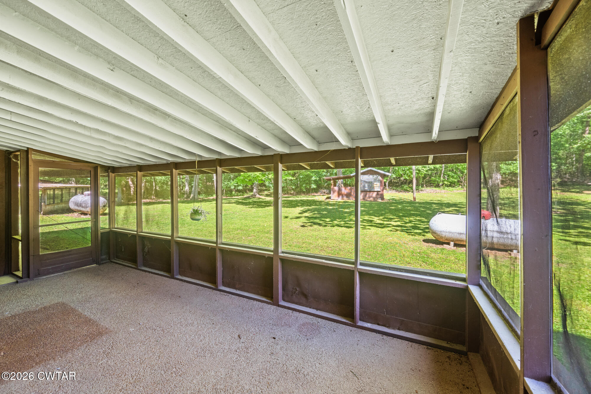 8932 Mt Carmel Road Decaturville, TN 38329 - Photo 8 of 47 a view of a deck hardwood flooring and an outdoor space