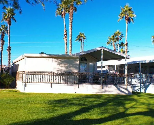 a view of a swimming pool with a patio