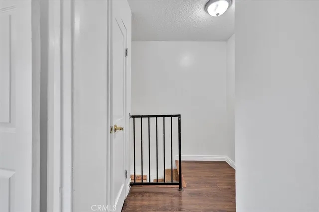 a view of kitchen with stainless steel appliances cabinets and a kitchen counter top
