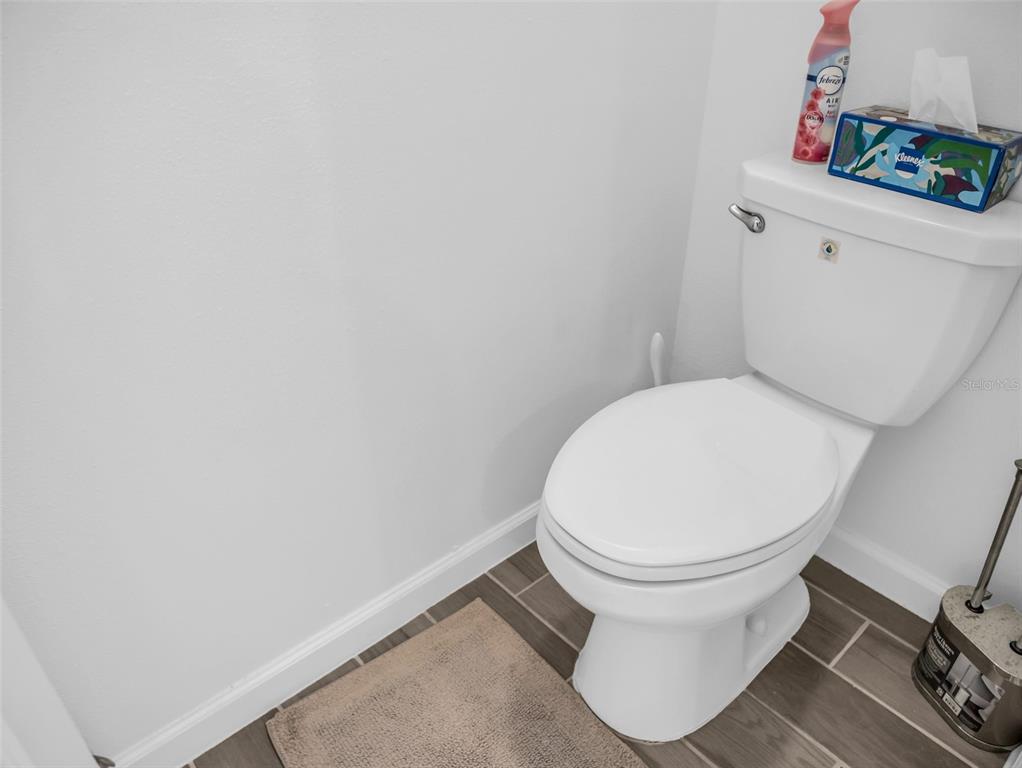 7474 Southwest 78th Terrace Ocala, FL 34481 - Photo 47 of 58 a white toilet sitting next to a white sink