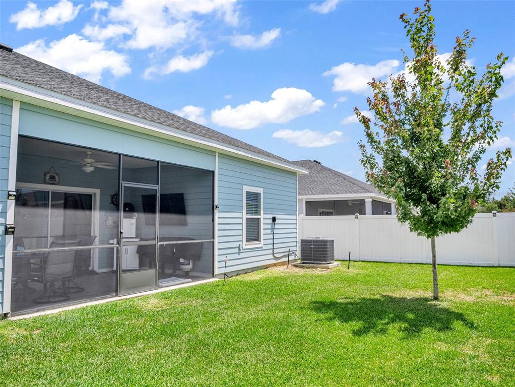 7474 Southwest 78th Terrace Ocala, FL 34481 - Photo 56 of 58 a view of a house with a yard