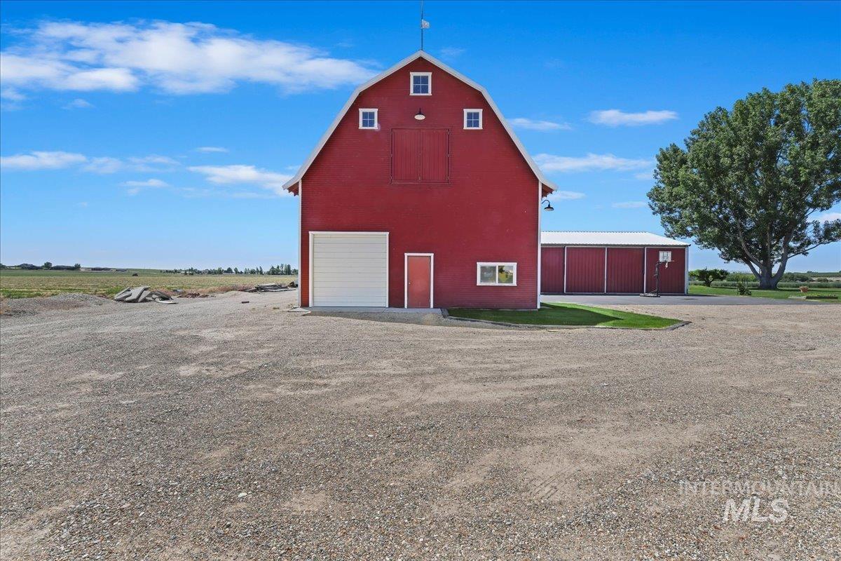 19234 Top Road Caldwell, ID 83607 - Photo 31 of 50 View of barn featuring driveway