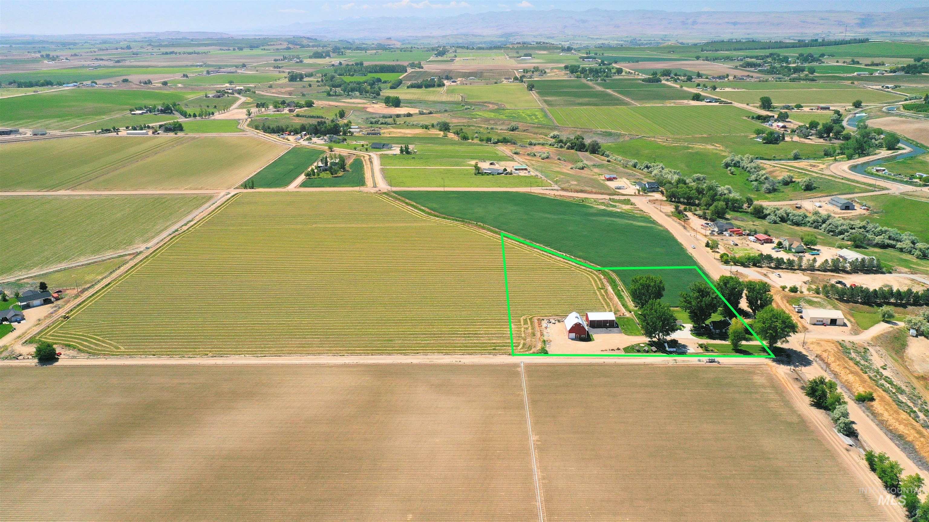 19234 Top Road Caldwell, ID 83607 - Photo 49 of 50 Aerial view of sparsely populated area featuring large plots for crops and property parcel outlined