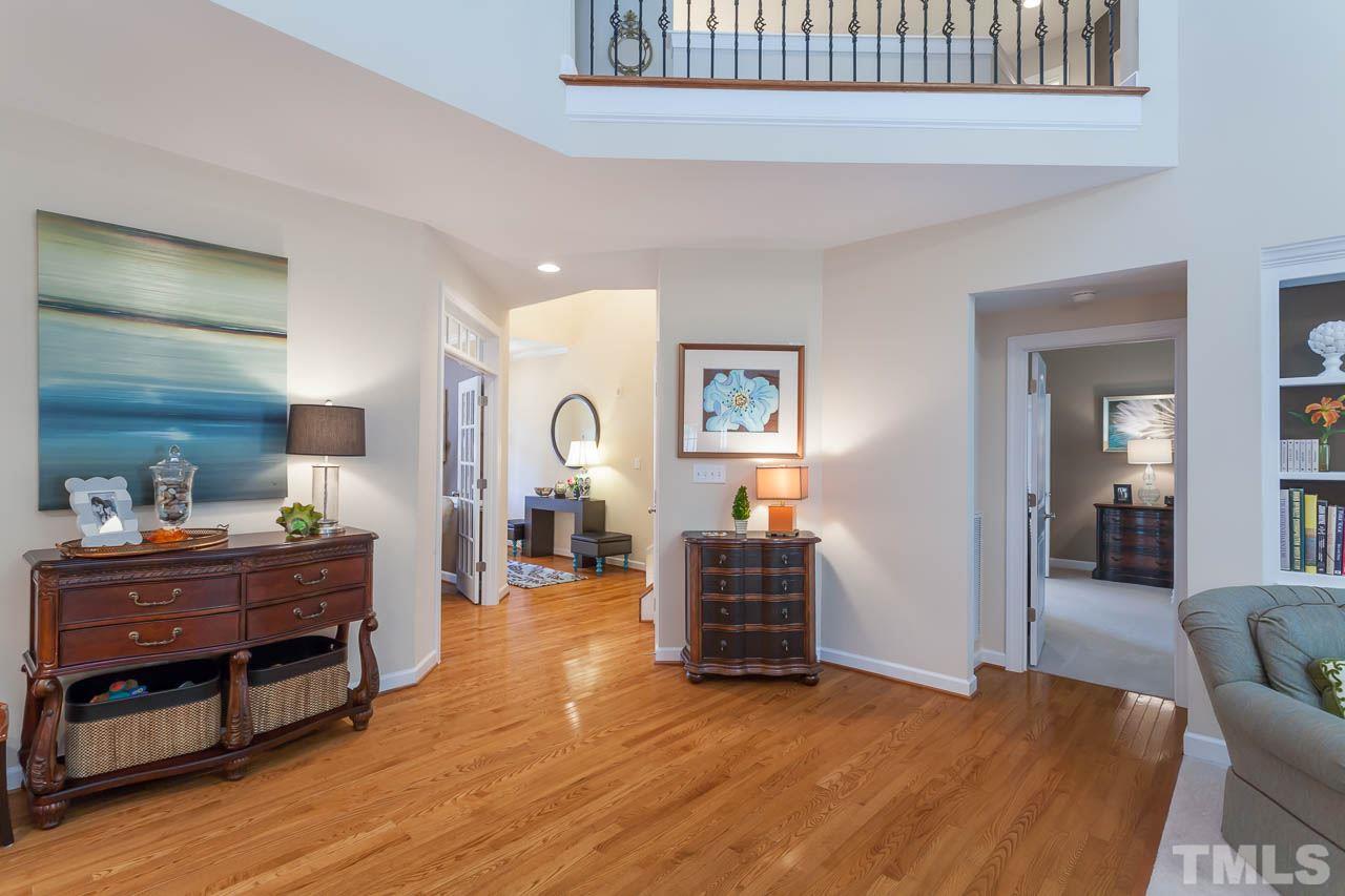 1014 Vino Drive Raleigh, NC 27607 - Photo 14 of 25 a living room with furniture and a table