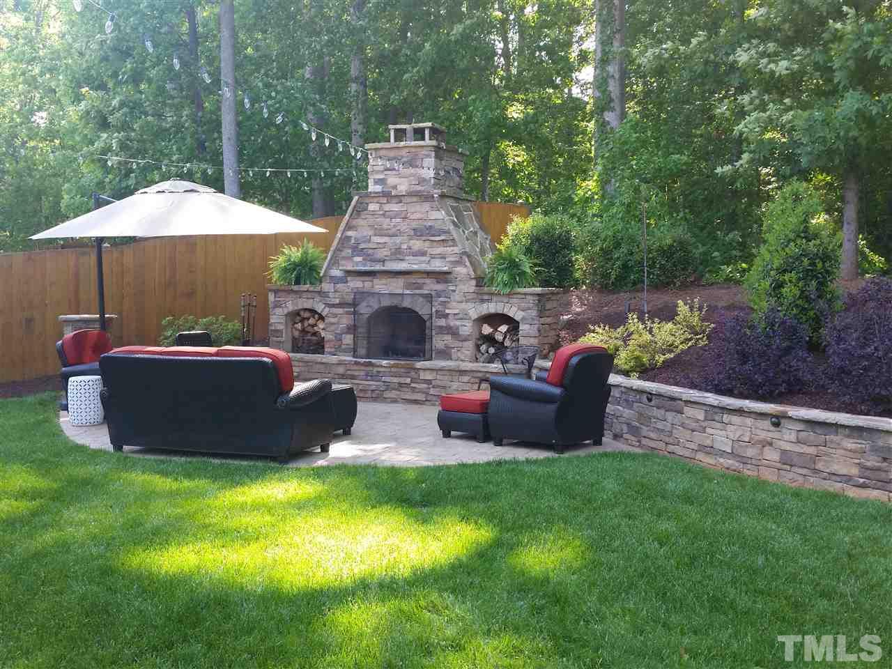 1014 Vino Drive Raleigh, NC 27607 - Photo 4 of 25 a view of a garden with furniture